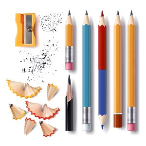 ołówki, temperówka i resztki pozostałe po struganiu ołówków